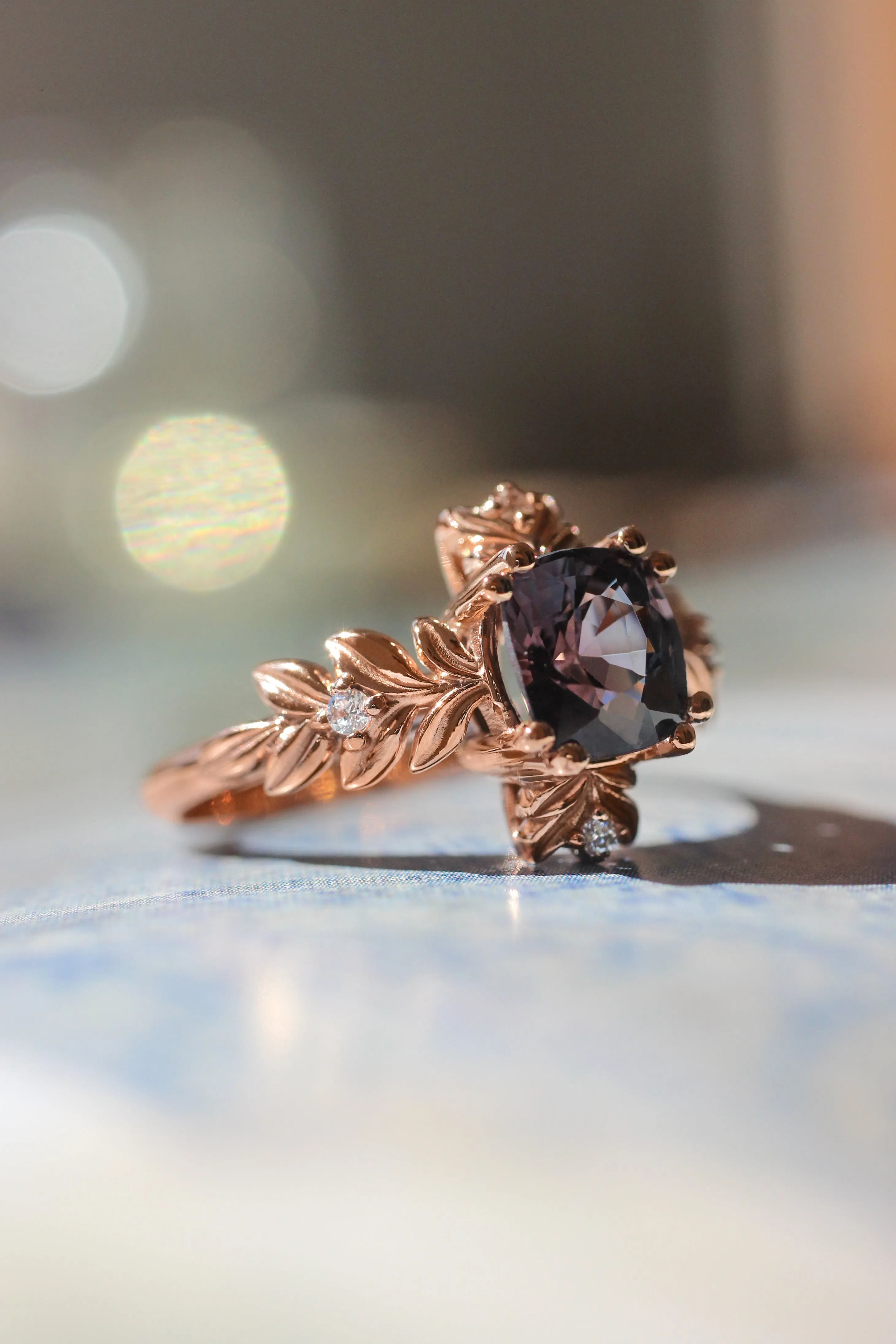 Purple spinel ring with diamonds, leaf engagement ring