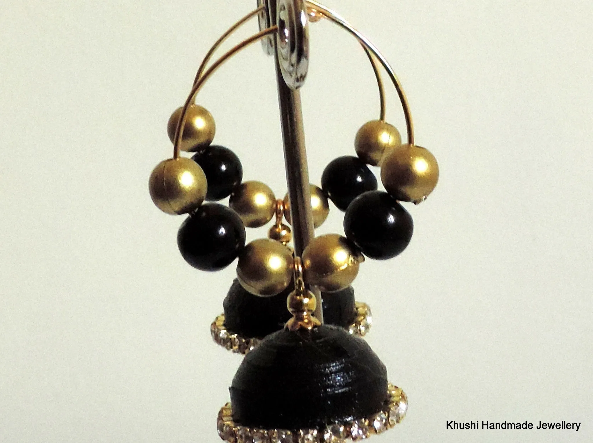 Quilled Jhumkas in black edged with white stone!